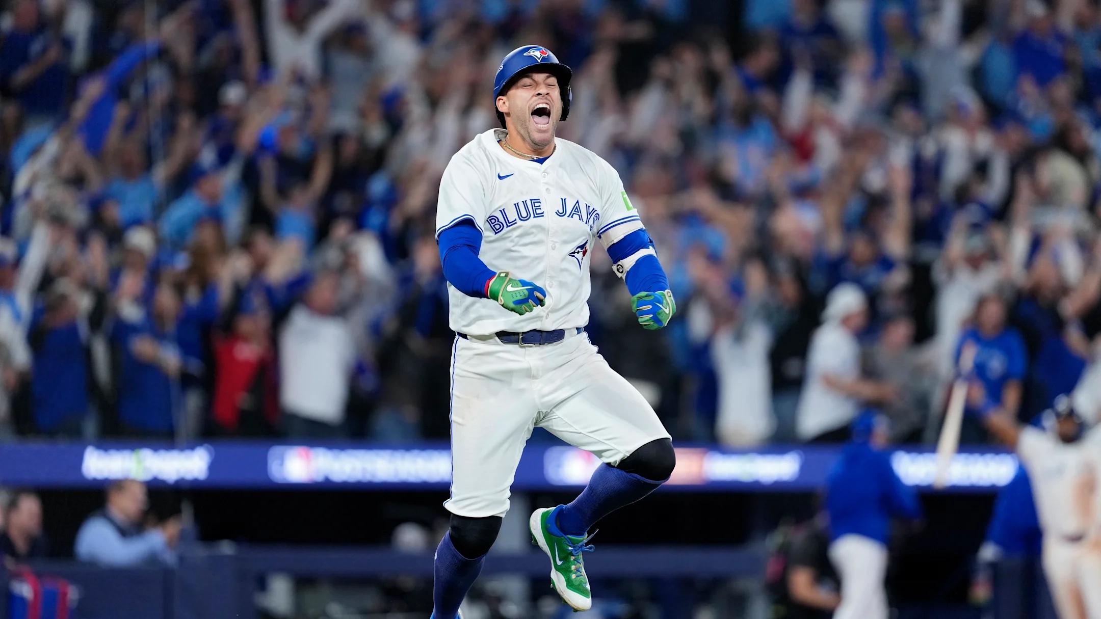 George Springer celebrating his 3-run homer against the Seattle Mariners in Game 7 of the ALCS / Mark Blinch, Getty Images