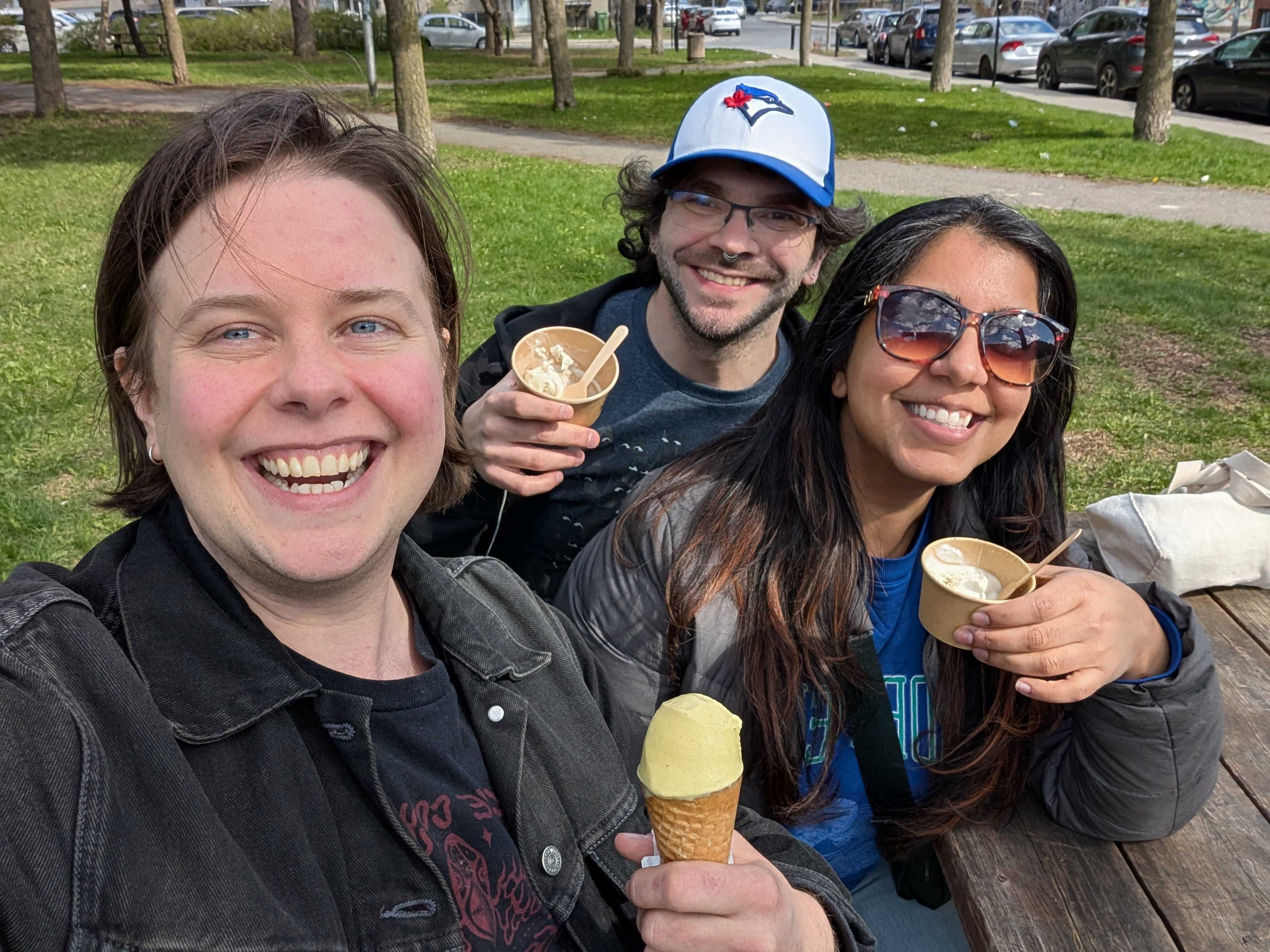 A group selfie in a park with all of us holding ice cream