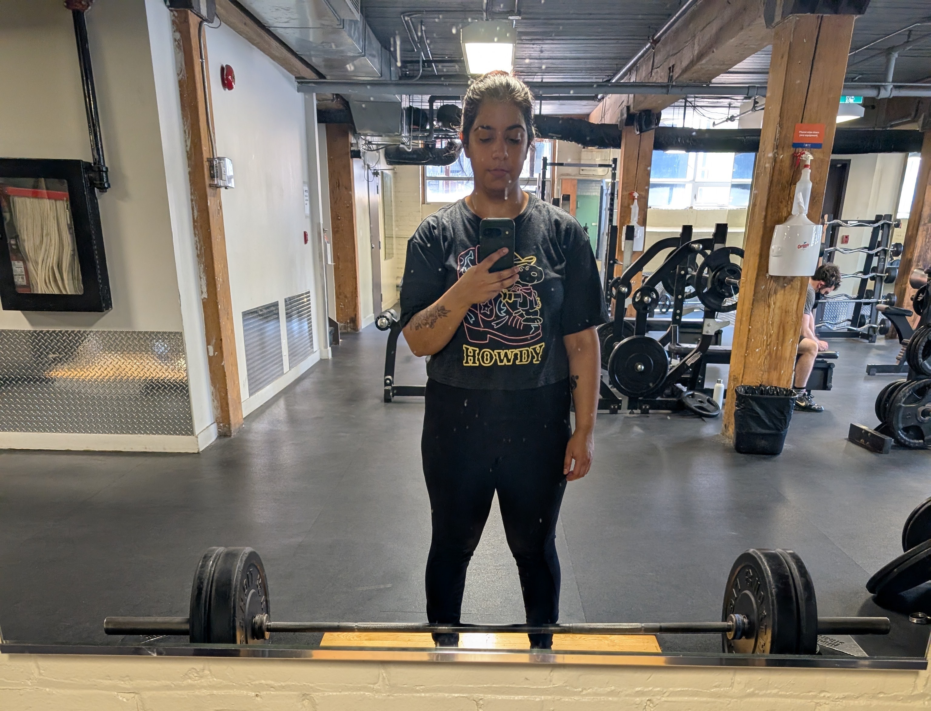 Mirror selfie with deadlift bar