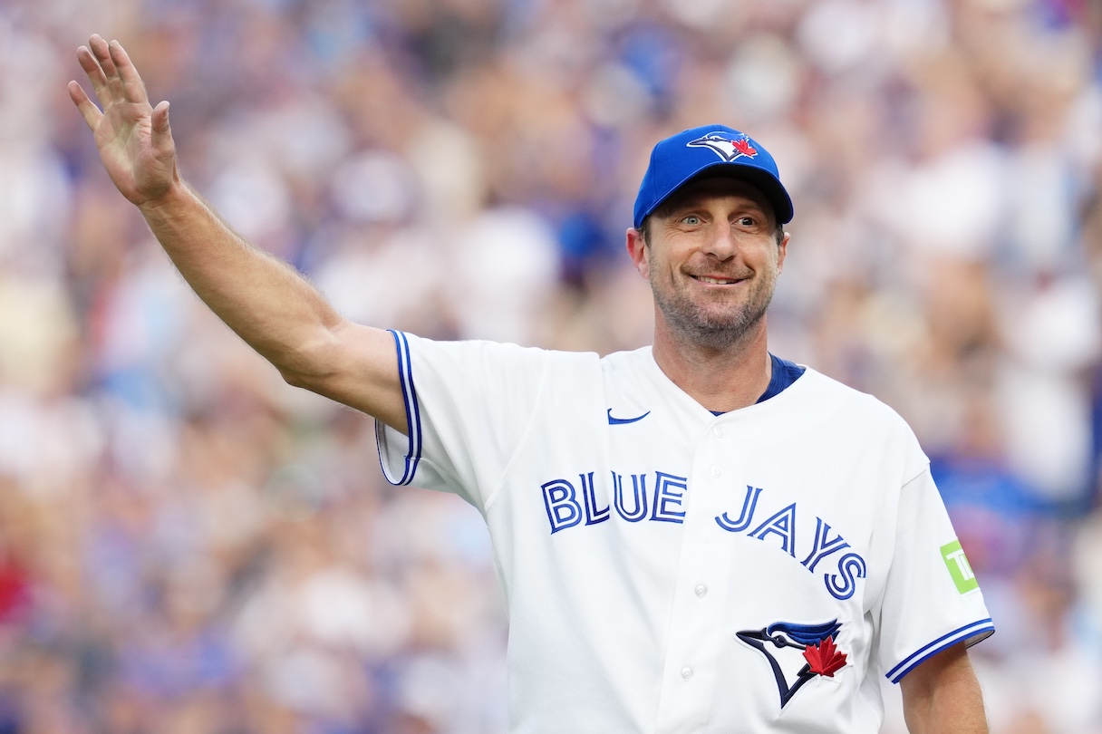 Max Scherzer in a Jays uniform, waving - photo by Frank Gunn, Canadian Press